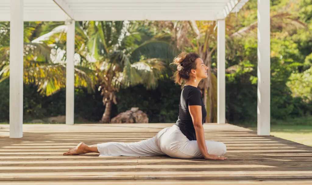 Best Caribbean Spa & Wellness Resort - Carlisle Bay woman doing yoga